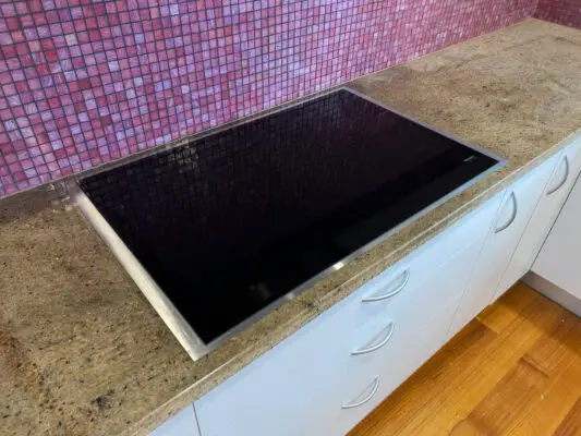 aesthetic filler panels Melbourne installed around induction cooktop